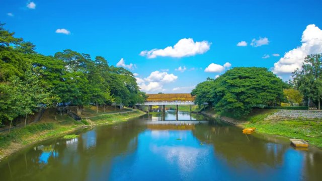 Timelapse and the bridge and the river in the blue sky 