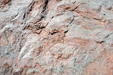 natural full frame background of porphyry rock wall