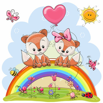 Two Foxes are sitting on the rainbow