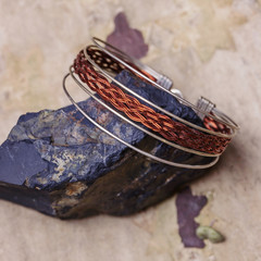 Beautiful female bracelet on natural background