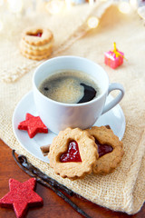 Christmas heart-shaped Cookies and coffee cup with decoration.