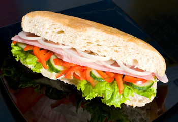 sandwich with ham and vegetables