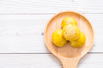 Chinese pastry or moon cake filled with mung bean paste and salted egg yolk