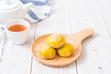 Chinese pastry or moon cake filled with mung bean paste and salted egg yolk