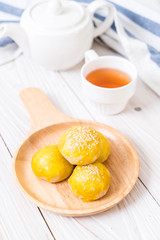 Chinese pastry or moon cake filled with mung bean paste and salted egg yolk