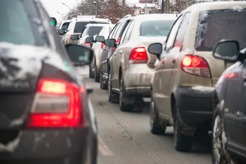 Cars in a traffic jam in winter. Selective focus