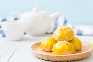 Chinese pastry or moon cake filled with mung bean paste and salted egg yolk