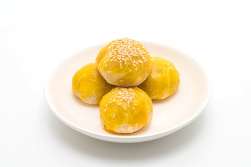 Chinese pastry or moon cake filled with mung bean paste and salted egg yolk