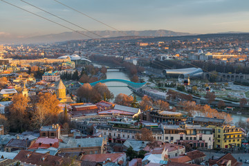 Obraz premium TBILISI, GEORGIA - DEC.11, 2017 : The cityscape of Tbilisi view from the hill