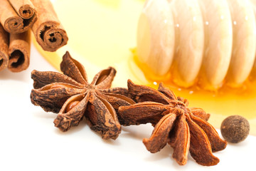  Honey with spices on a white background closeup