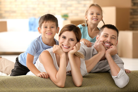 Happy family in new flat