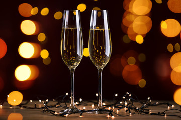 Toast by champagne glasses