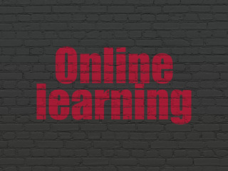 Obraz premium Studying concept: Painted red text Online Learning on Black Brick wall background