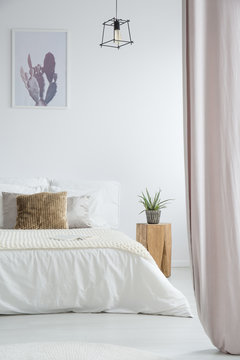 Bright bedroom with pink curtains