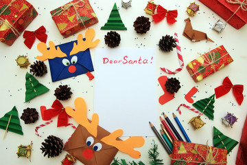 Child writing letter to Santa Claus