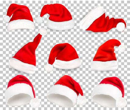 Collection of red santa hats on transparent background. Vector.