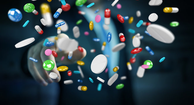Businessman holding and touching floating medicine pills 3D rendering