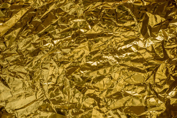 golden creased metallic foil abstract bacgkground