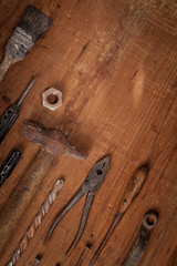 Collection of vintage tools on wooden background