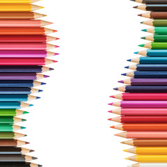 Close up of colorful colored pencil set isolated on white background.
