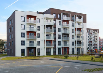 Panorama of a modern standard concrete houses buildings construction  in a small European city.