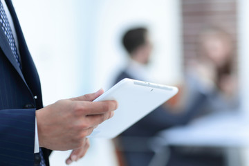 closeup.businessman with tablet computer