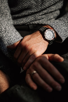 close-up of a man's watch on his hand