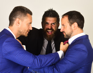 Conflict and business concept. Businessmen wear smart suits