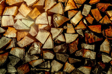 Stack of dry firewood can be used as background