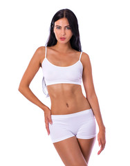 Fototapeta premium Sexy woman in white fitness clothing