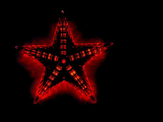 Obraz premium five-pointed red star on a black background