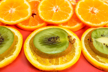 Naklejka na ściany i meble background of oranges of mandarins and grapefruits 