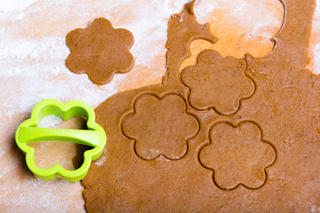 Preparing Christmas gingerbread cookies. Gingerbread dough and cookies ingredients.