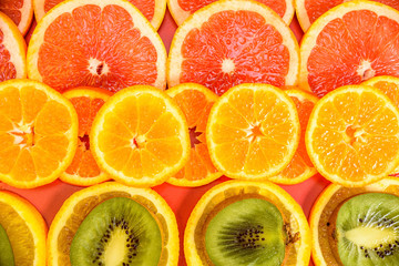 background of oranges of mandarins and grapefruits 