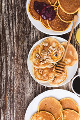 Pumpkin and  buttermilk pancakes breakfast or brunch. Table viewed from above