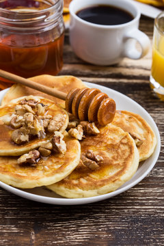 Mother's day brunch with  delicious pancakes with honey and nuts
