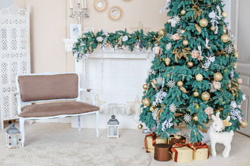 Interior of a room with a fir tree and a fireplace. Concept background, Happy Christmas, New Year, Winter, home, interior.