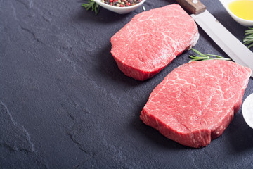 Raw beef steak with rosemary