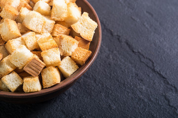 Crispy croutons in bowl