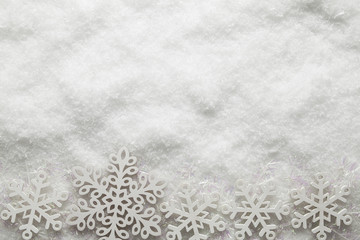 Christmas background - snowflakes on snow