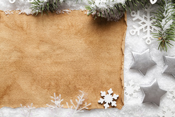 Christmas background - handmade paper sheet, snowflakes and spruce tree
