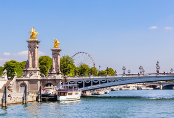 The Alexander III Bridge across the Seine in Paris, France. View from the water