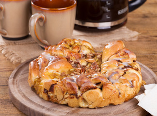 Whole Apple Pecan Sweet Bread on a Wooden Platter