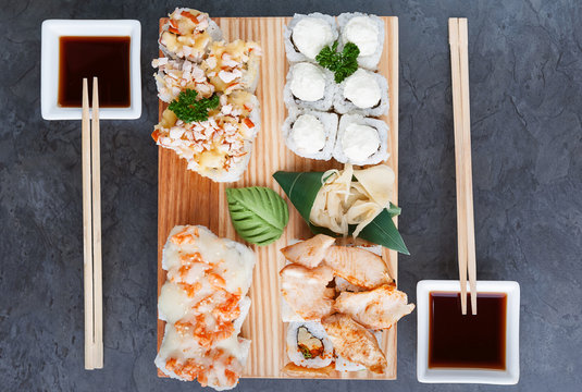 set of real classic Japanese sushi. on a wooden surface