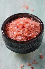 Himalayan Salt on turquoise wooden surface