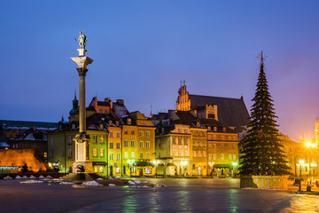 Fototapeta na wymiar Column of Zygmunt and a Christmas tree in the Old Town in Warsaw, Poland