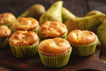 Homemade sweet muffins with pear stuffing.
