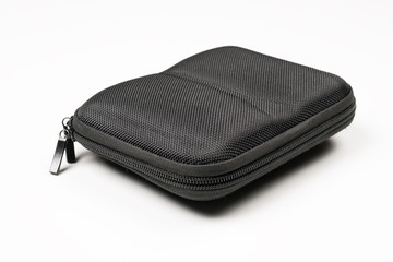 Side view of black hard case for batteries for drone on white background