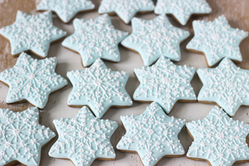 Gingerbread star cookie for Christmas on white background.