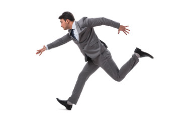 Young businessman running forward isolated on white